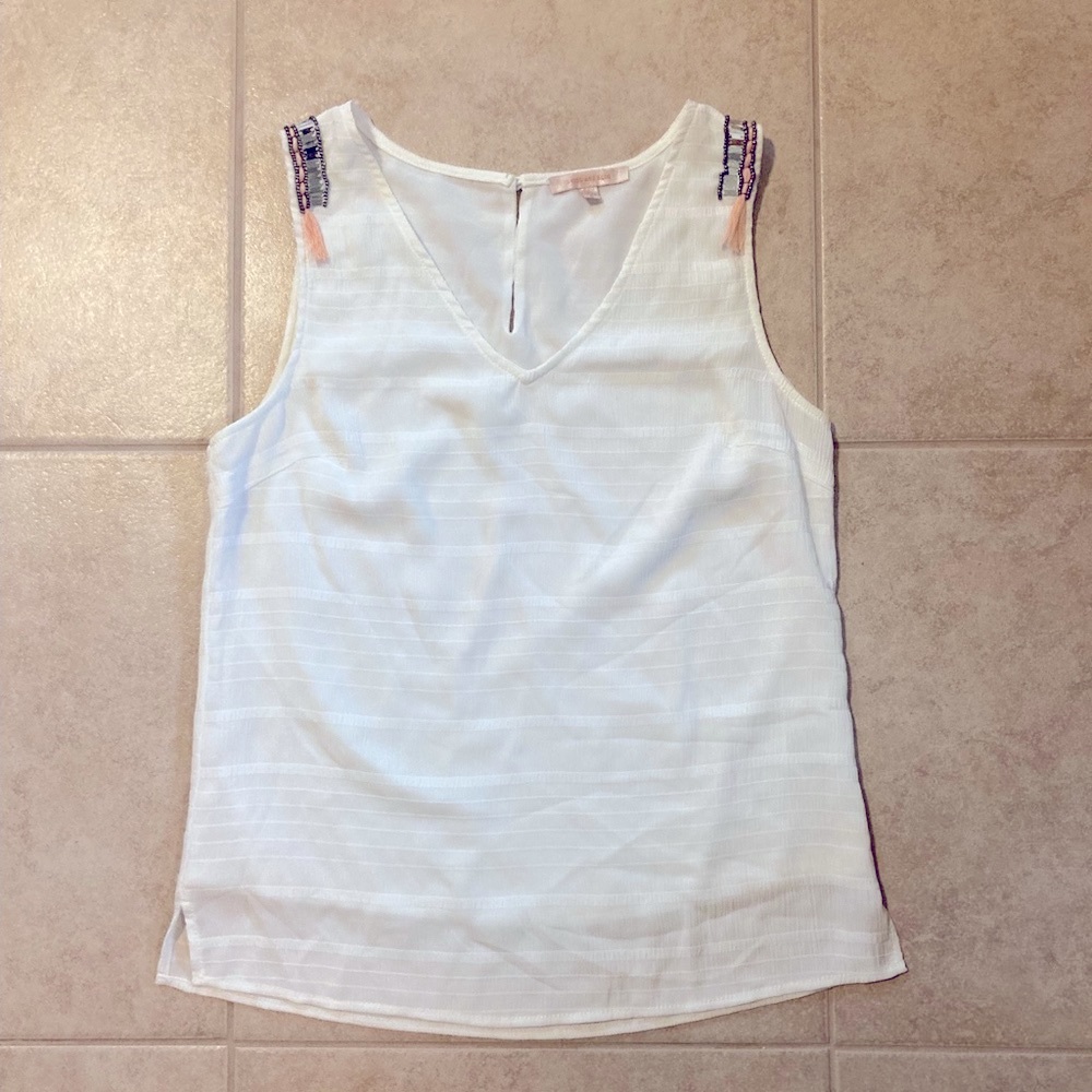 Elegant tank with detailed straps